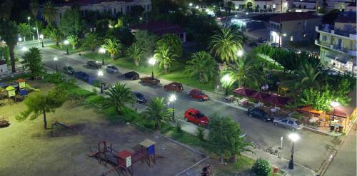 an aerial view of a city street at night at Hotel Liberty in Mesolongion