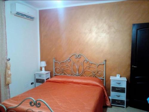 Postel nebo postele na pokoji v ubytování Lampedusa da Sogno 1