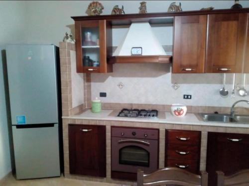 Kuchyň nebo kuchyňský kout v ubytování Lampedusa da Sogno 1