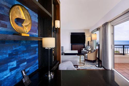 a hotel room with a view of the ocean at Hilton Guam Resort & Spa in Tumon