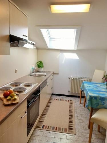 Kuchyň nebo kuchyňský kout v ubytování Ferienwohnung Vier Jahreszeiten