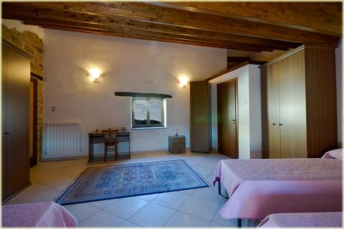 Llit o llits en una habitació de Il Palazzo del Barone - Stanza dei Ravelli