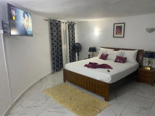 Postel nebo postele na pokoji v ubytování Suite vip au teranga royale lodge