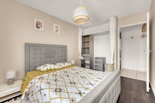 Ένα ή περισσότερα κρεβάτια σε δωμάτιο στο Le Chapitre Toulousain