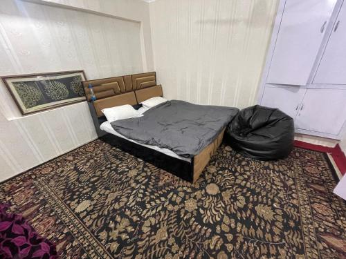 Кровать или кровати в номере Al Hassan