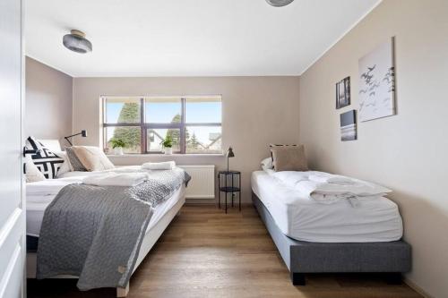 Posteľ alebo postele v izbe v ubytovaní Great Restful Location in the Suburbs - Retreat
