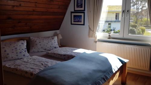 Postel nebo postele na pokoji v ubytování Hagebutte