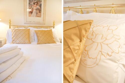a bedroom with a bed with white sheets and golditures at Bankton Rooms & Lodges in Livingston