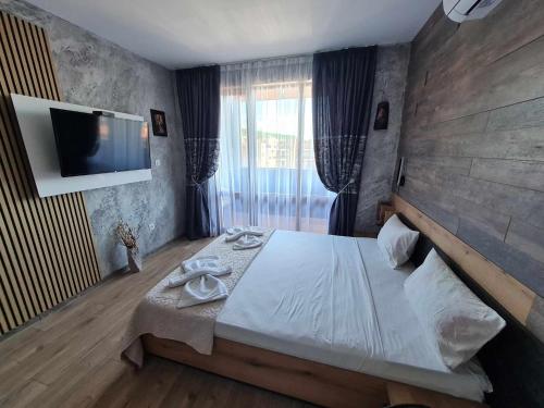 Postel nebo postele na pokoji v ubytování MitProt Panorama Bay 2 Studio 206