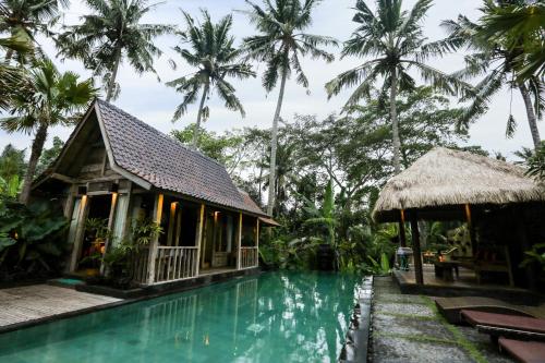 La alberca dentro o cerca de Ubud Virgin Villa