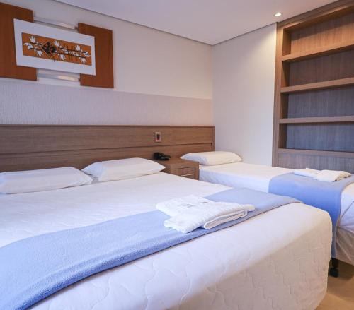 Postel nebo postele na pokoji v ubytování Hotel Imperatriz