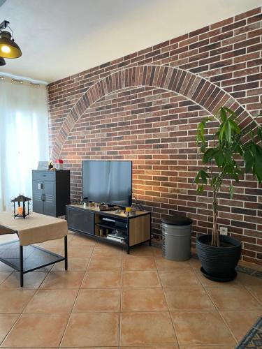 TV a/nebo společenská místnost v ubytování Kazeths Chambre chez l'habitant