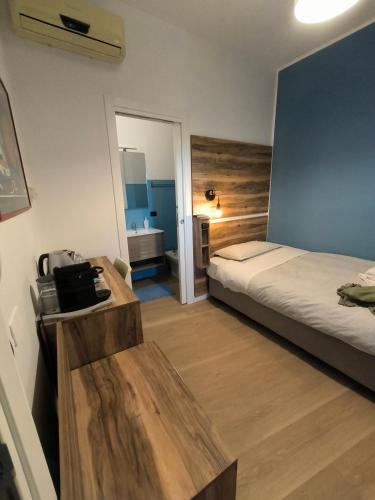 Letto o letti in una camera di Santa Lucia