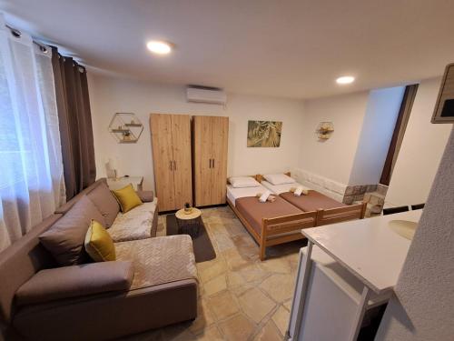 Posezení v ubytování Apartmani Vuki