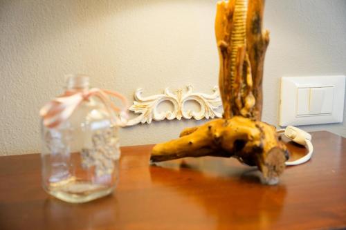 a banana sitting on a table next to a bottle at Villa Mandrioli in Cecina