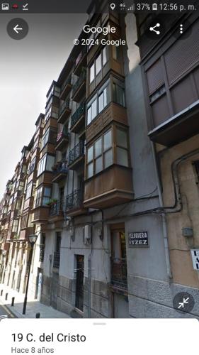 a tall building with balconies on the side of it at A 5 minutos andando del Casco Viejo, ayuntamiento, Plaza Circular y Gran Vía de Bilbao y próximo a las 2 líneas de metro in Bilbao