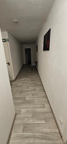 an empty hallway with a room with at Gasthaus Ochsen in Rottweil