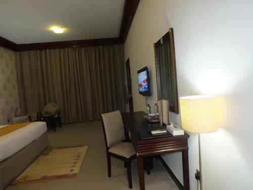 Postel nebo postele na pokoji v ubytování Verona Resorts Sharjah