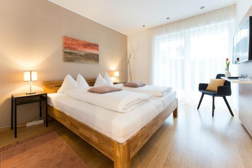 Un pat sau paturi într-o cameră la Apartment Oberlechner