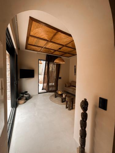 an arched hallway in a house with a ceiling at Na Xamena in La Croix-Valmer