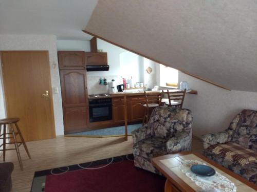 Kuchyň nebo kuchyňský kout v ubytování Ferienwohnung am Schwielochsee - b45298