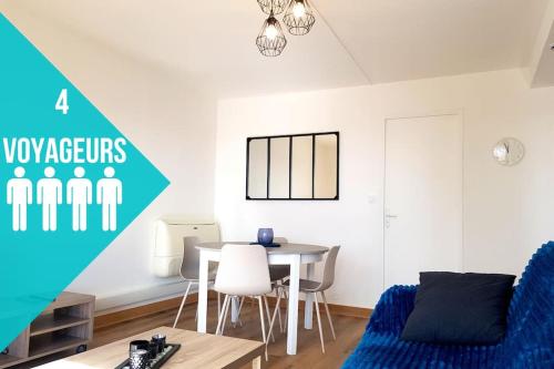 un salon avec une table et des chaises dans l'établissement Chaleureux T3 (Proche rempart) - 2 Chambres - WIFI, à Avignon