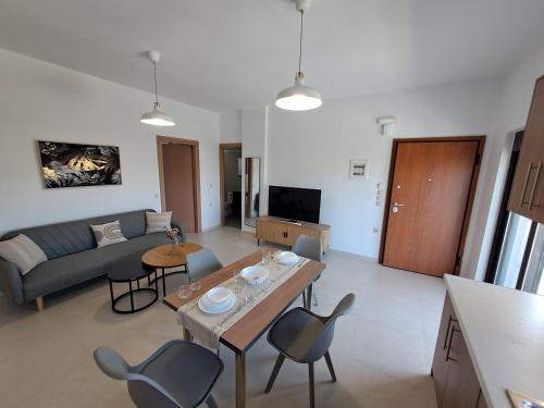 TV a/nebo společenská místnost v ubytování Olea Homes