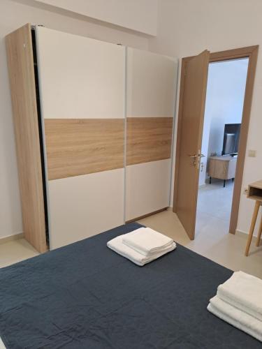 Postel nebo postele na pokoji v ubytování Olea Homes