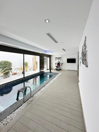 Πισίνα στο ή κοντά στο Exquisite Luxury Paradise