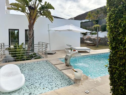 Πισίνα στο ή κοντά στο Exquisite Luxury Paradise