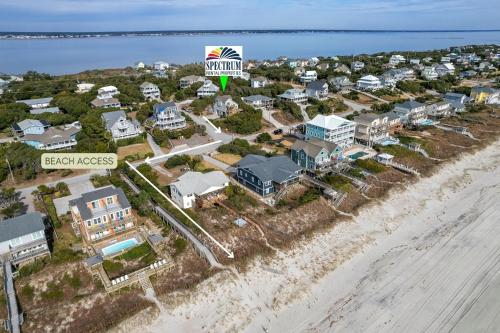 an aerial view of a resort on the beach at Azure home in Emerald Isle