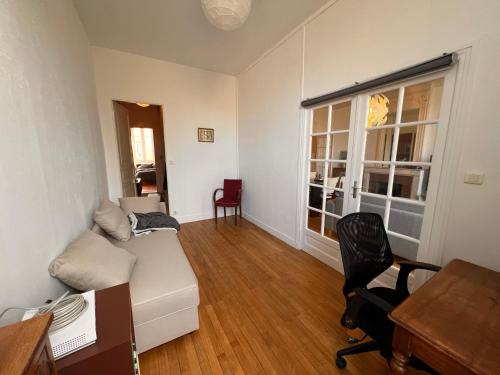 Χώρος καθιστικού στο La Colbertine - Charming Apartment in Place Colbert