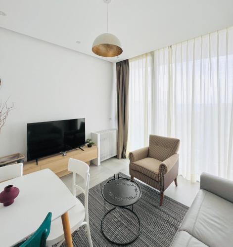 TV a/nebo společenská místnost v ubytování Vesper Suites