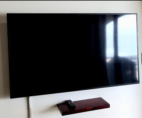 TV a/nebo společenská místnost v ubytování Bali Hai