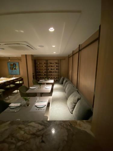 a living room with a couch and a table at HCM - Hotel Corais de Manaira in João Pessoa
