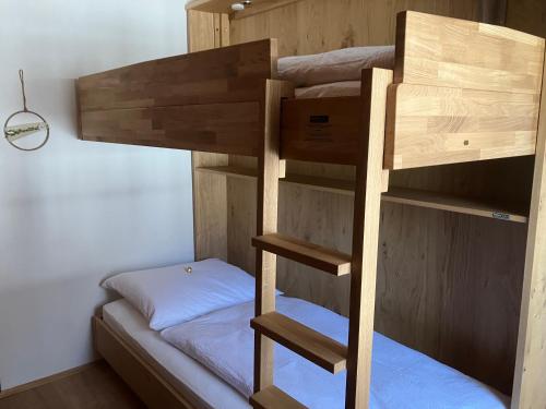 a bunk bed in a small room with a bunk bedouble at Villa Elisabeth in Strobl