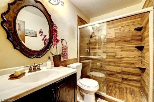a bathroom with a sink and a toilet and a shower at Boho Haus - Three Bedrooms House in Las Vegas in Las Vegas