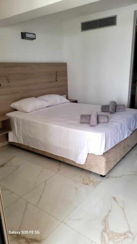 Katil atau katil-katil dalam bilik di Simos Magic Beach Hotel Apts