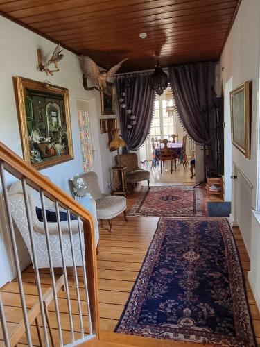 Posezení v ubytování Villa Signedal Hostel