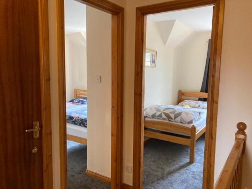 Ένα ή περισσότερα κρεβάτια σε δωμάτιο στο Sunbury Aviemore