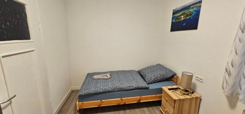 a small room with a bed in the corner at Gasthaus Ochsen in Rottweil