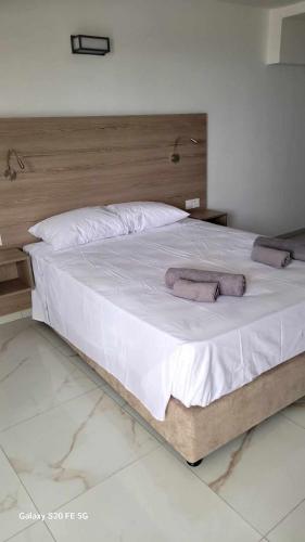 Katil atau katil-katil dalam bilik di Simos Magic Beach Hotel Apts