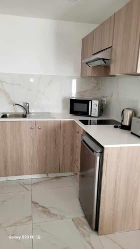 Dapur atau dapur kecil di Simos Magic Beach Hotel Apts