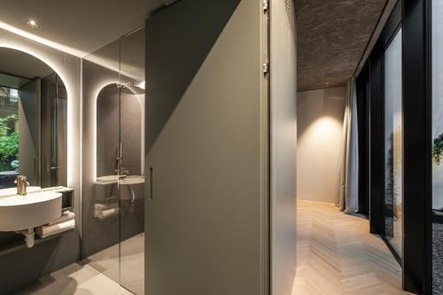 Mynt Merano Roomsにあるバスルーム