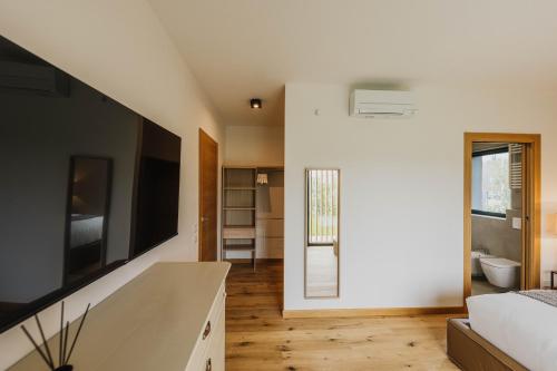 Postel nebo postele na pokoji v ubytování Luxe Villa Maxime