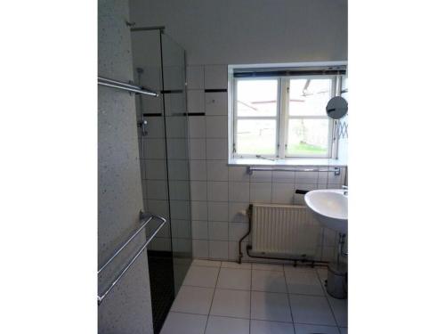 Ванная комната в Holiday apartment Kröte 5