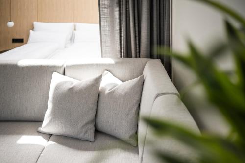Mynt Merano Roomsにあるベッド