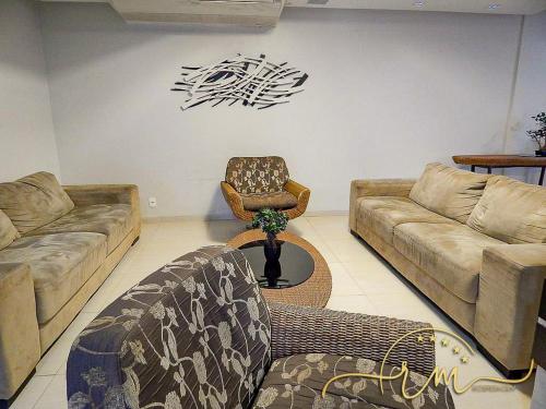 Χώρος καθιστικού στο Eldorado Thermas Park RM Hospedagem