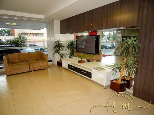 Μια τηλεόραση ή/και κέντρο ψυχαγωγίας στο Eldorado Thermas Park RM Hospedagem