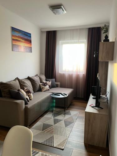 Гостиная зона в Airport SKY apartments LUX